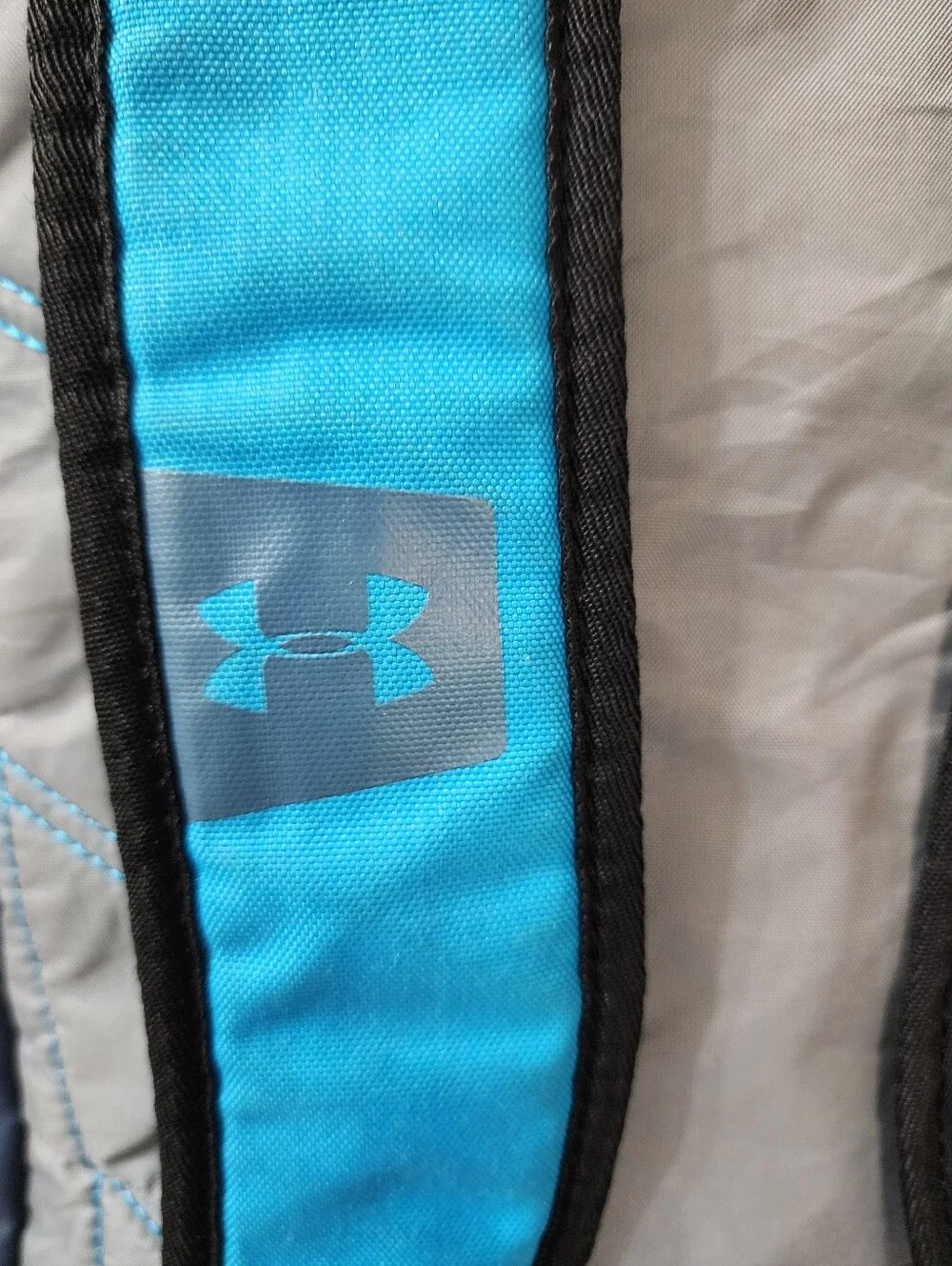 M.169- Under Armour Storm Backpack, blue teal, USED